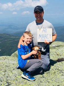 Photo submitted - Sammy Roorda Jr. and his dad Sam, pose for a picture on the Mt Marcy summit.