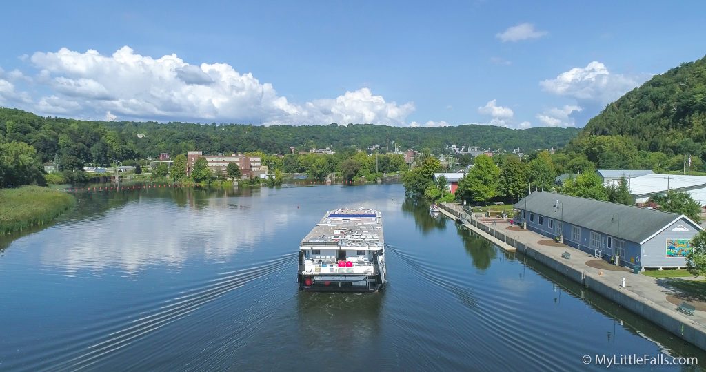 Photo by Dave Warner - The Grande Mariner passes by the Little Falls Harbor on its way to Lock 17 during the summer of 2018.