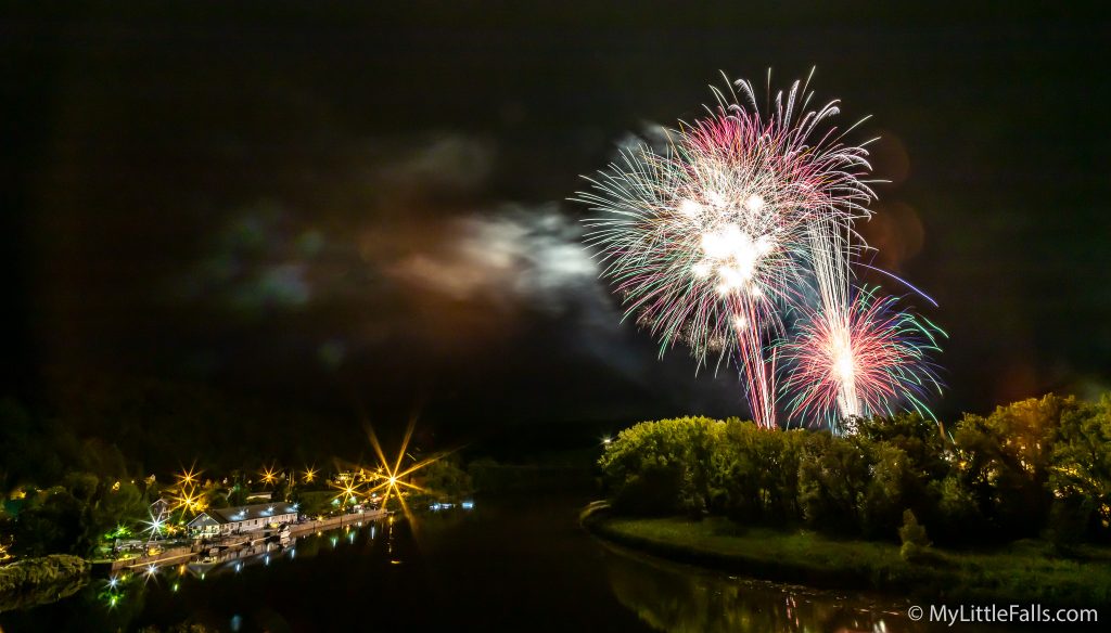 Photo by Dave Warner - Fireworks over the Little Falls Harbor during Canal Celebration.