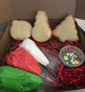 A Christmas Cookie Decorating Kit complete with cookies, frostings, and sprinkles!