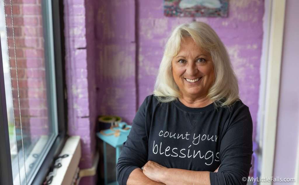 Photo by Dave Warner - Marchell Giorgi Scarano poses in her studio in Little Falls after a class.