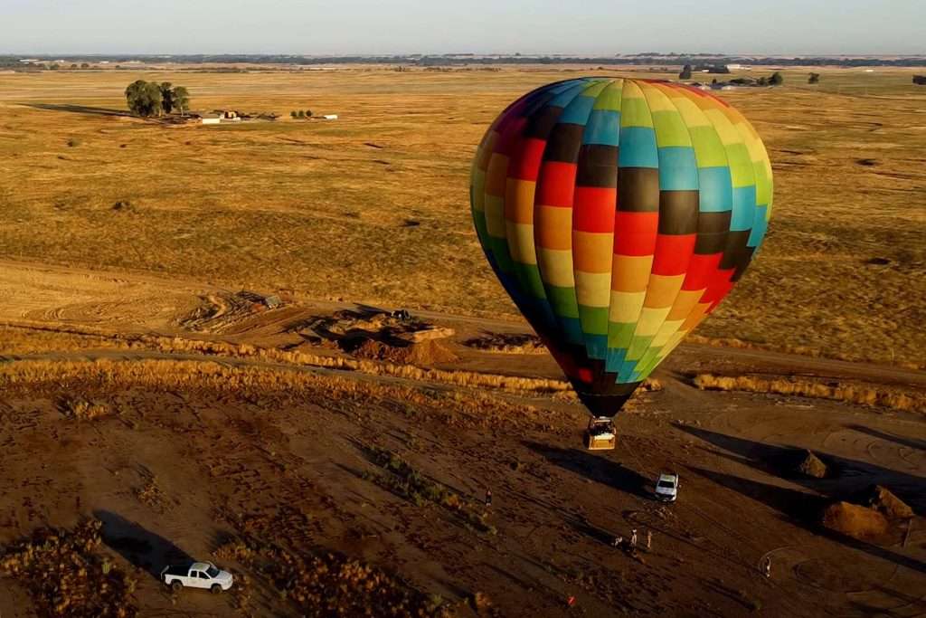 Before things got muddy, DJ Diplo performed from a hot air balloon and woke up Burning Man 2023 festival goers at sunrise on Friday. Courtesy of Looners Camp