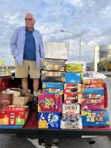 Photo submitted - Bruce Bennett, a volunteer, drops off some of the items.
