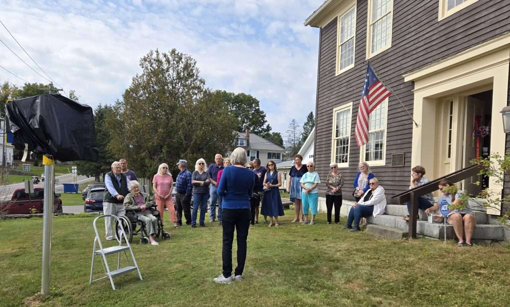 Nora Cool-Guinup addresses the crowd at the historic marker dedication ceremony.
