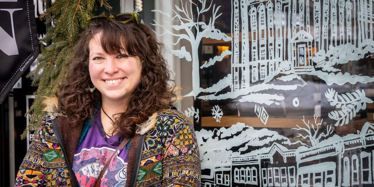 Local artist goes from windows to walls with her work