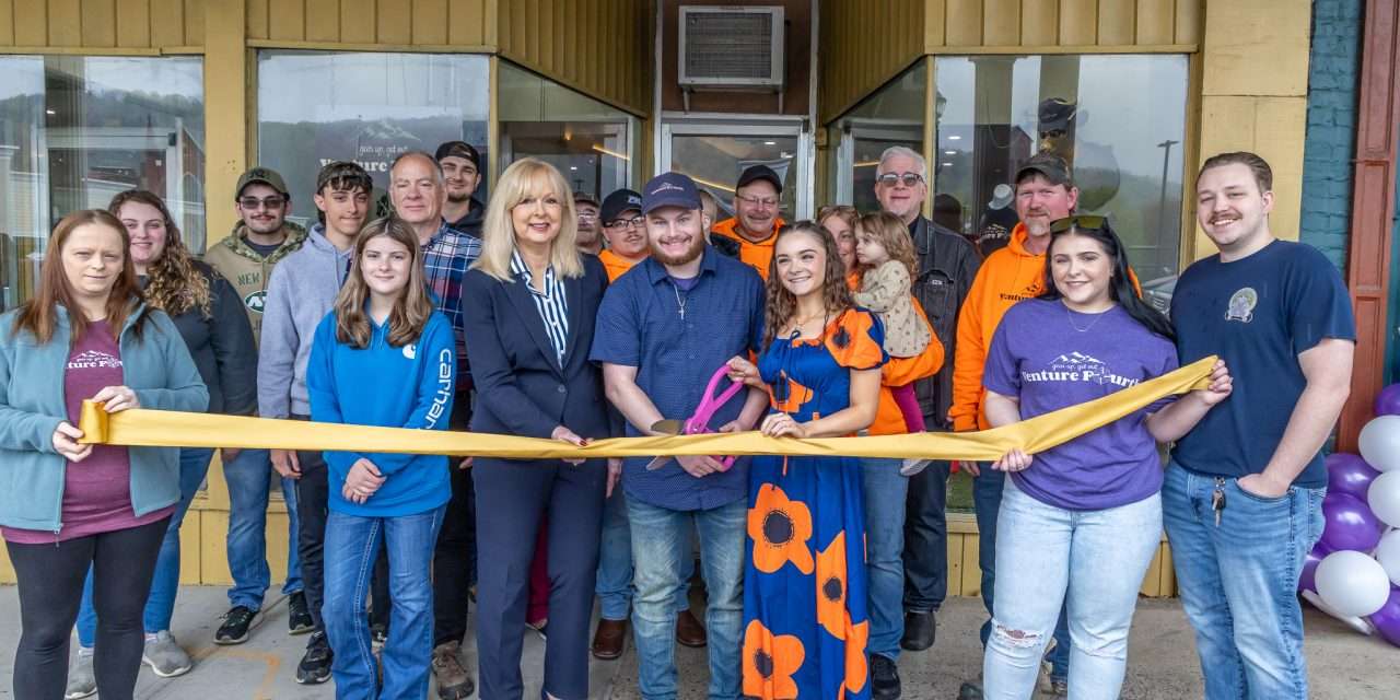 It was a busy Saturday with two ribbon cuttings on Main St