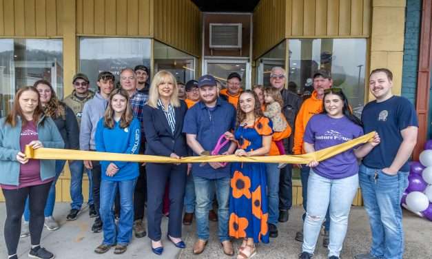 It was a busy Saturday with two ribbon cuttings on Main St