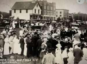 Harrison Avenue in downtown Old Forge c. 1915 - The large brick building on the north side of the street is the newly constructed Old Forge Hardware Store.